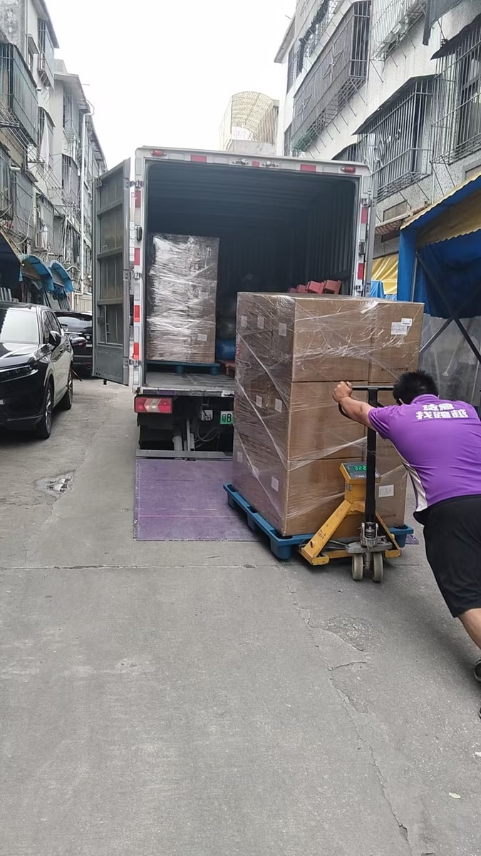 Cartons being moved to the delivery vehicle