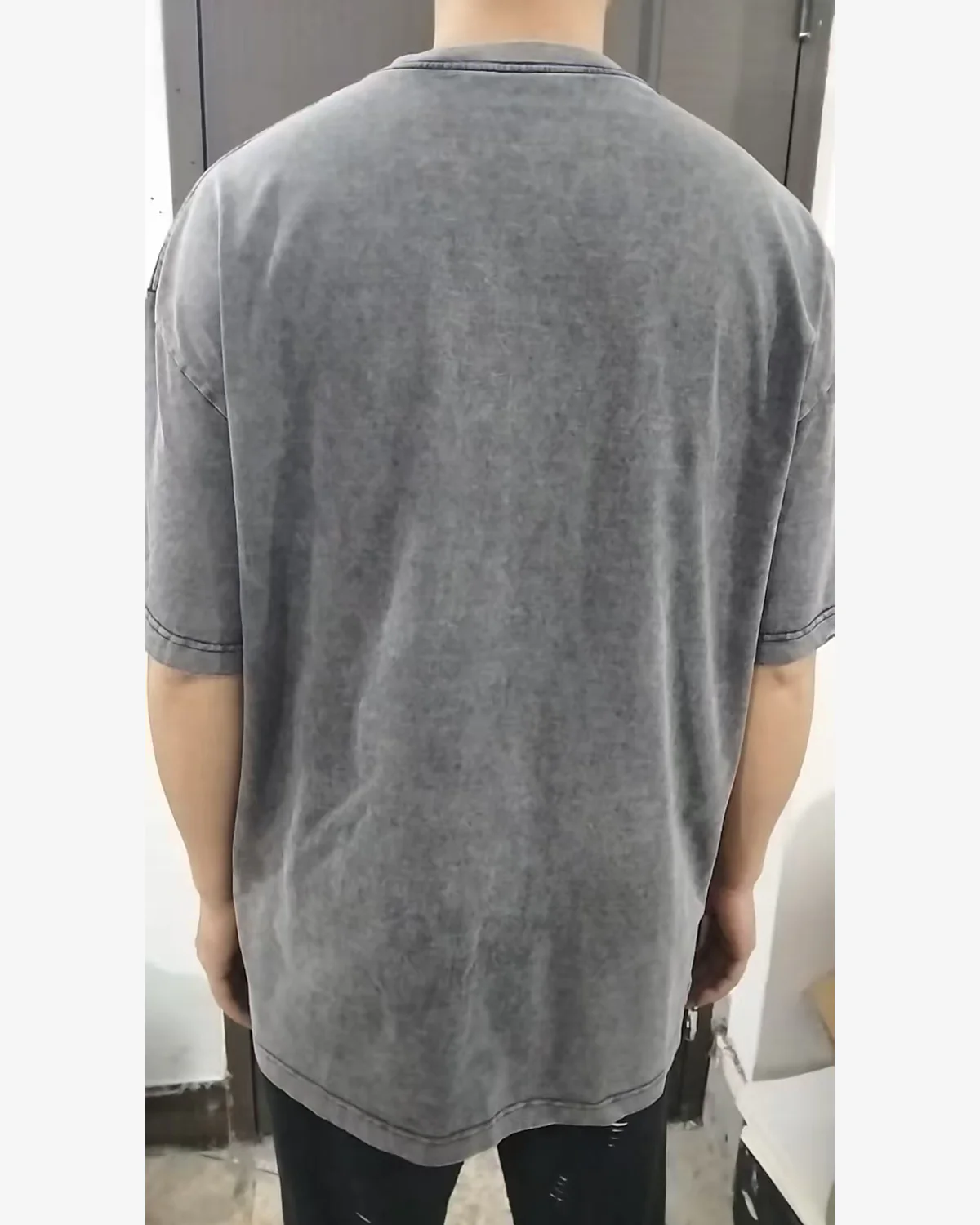 Back fit review of grey vintage washed oversized cotton T-shirt
