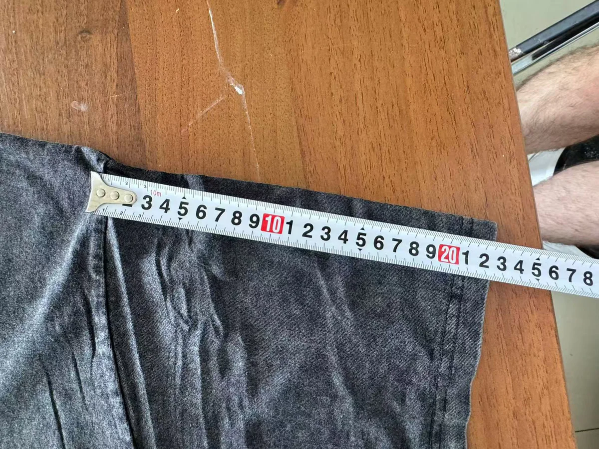 Sleeve measurement detail for a vintage washed T-shirt sample